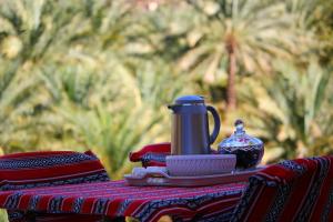 Koffie- en theefaciliteiten bij Mahalli Balad Sayt Heritage Inn