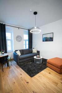 Posezení v ubytování STILVOLLES APARTMENT