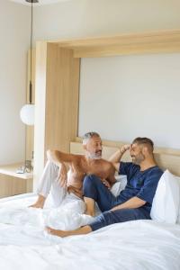 The St Laurent Guest Rooms客房内的一张或多张床位