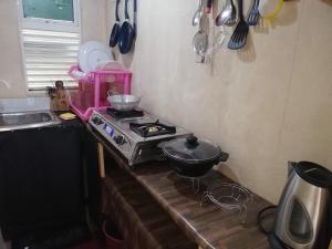 Kuchyň nebo kuchyňský kout v ubytování Sea Breeze Garden