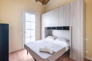 En eller flere senge i et værelse på Residenza_Golf_Club