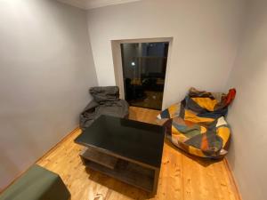 Televízia a/alebo spoločenská miestnosť v ubytovaní Guesthouse LUKA