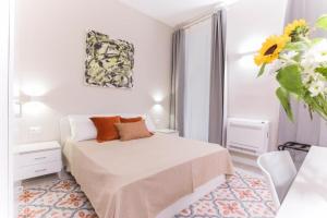 Posteľ alebo postele v izbe v ubytovaní Donna Isa B&B