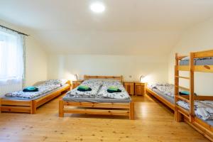 Posteľ alebo postele v izbe v ubytovaní Apartmány Petra