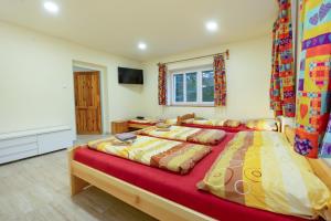 Postel nebo postele na pokoji v ubytování Apartmány Petra