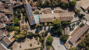 an overhead view of an abandoned building with trees at Granja San Miguel in Salem