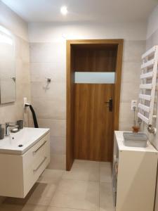 Kúpeľňa v ubytovaní Apartament pod Grojcem