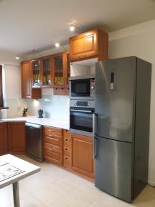 Kuchyňa alebo kuchynka v ubytovaní Apartament pod Grojcem