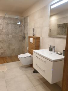 Kúpeľňa v ubytovaní Apartament pod Grojcem