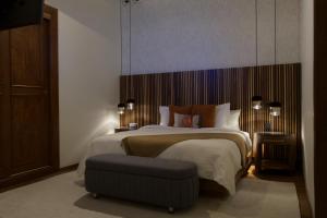 Postel nebo postele na pokoji v ubytování Nueve 25 Hotel Boutique
