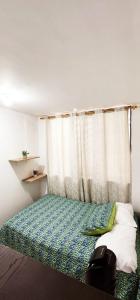 Cama o camas de una habitación en Confortable apartamento en Laureles