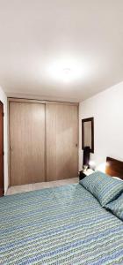 Ліжко або ліжка в номері Confortable apartamento en Laureles
