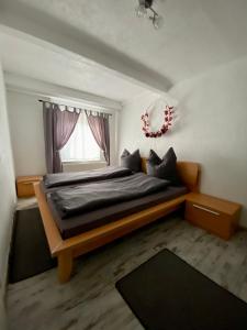 Postel nebo postele na pokoji v ubytování El Greco Ferienwohnung