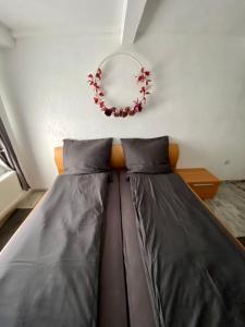 Postel nebo postele na pokoji v ubytování El Greco Ferienwohnung