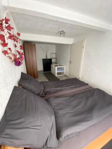 Postel nebo postele na pokoji v ubytování El Greco Ferienwohnung