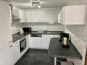 Kuchyň nebo kuchyňský kout v ubytování El Greco Ferienwohnung