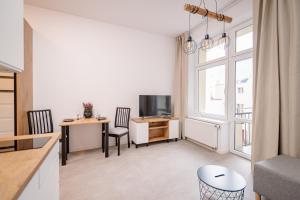 Telewizja i/lub zestaw kina domowego w obiekcie Ottimo Apartamenty Jagiellońska