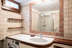 a bathroom with a sink and a shower at Casa Turandot Verona in Verona