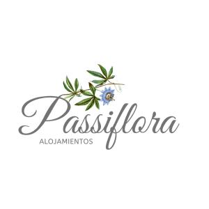 a logo for a restaurant with a blue flower at Alojamiento Passiflora I in Villa Elisa