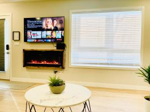 TV at/o entertainment center sa Joes Brand New 2 King Bedrooms Townhome in Canmore