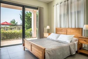 Ein Bett oder Betten in einem Zimmer der Unterkunft Villa Costa