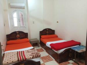 Aswan City Center Guest House客房内的一张或多张床位