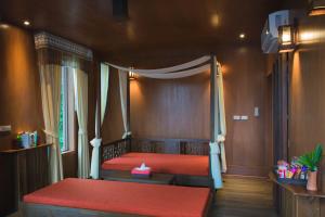 a bedroom with a bed with a star on it at Panviman Resort Koh Phangan - SHA Extra Plus in Thong Nai Pan Noi