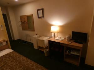 Voodi või voodid majutusasutuse Hotel Tsuchiya toas
