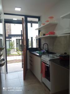 Una cocina o kitchenette en Mono Chancas