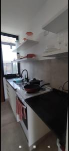 Una cocina o kitchenette en Mono Chancas