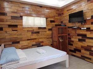 Postel nebo postele na pokoji v ubytování Woodland Inn