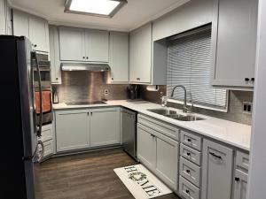 A kitchen or kitchenette at Modern Lakefront Views at Lake Hickory Haven
