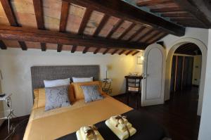 a bedroom with a large bed in a room at Armonia della Sera B&B and Relax in Porto SantʼElpidio +61 photos