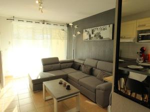 Posedenie v ubytovaní Charmant T3 à Montauban-de-Luchon, 41m², véranda, jardin sud 58m², parking sécurisé - FR-1-313-219