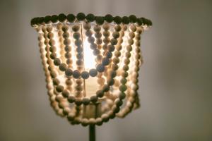 a close up of a lamp with beads on it at Castle Terrace - Grampian Lettings Ltd in Aberdeen