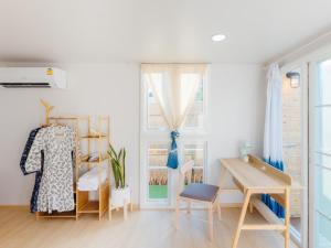 Ein Sitzbereich in der Unterkunft Ikigawa Home