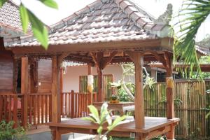 Balkón nebo terasa v ubytování Teba Junjungan Cottages