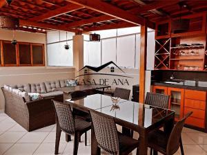 a dining room with a table and some chairs at Hostal Casa de Ana in Nazca