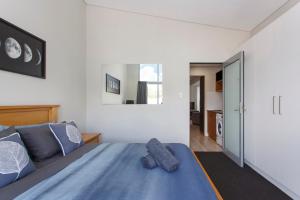 Ένα ή περισσότερα κρεβάτια σε δωμάτιο στο Waverley apartment C-one bedroom wifi available