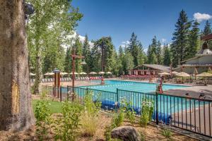 The swimming pool at or close to Cozy Northstar Village Condo Walk to Lifts 2 Full BA Excellent Location and Lots of New Snow