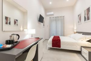A bed or beds in a room at La Torre 31