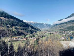 a small town in a valley with mountains at Chalet Badberg in Bad Gastein