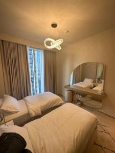 Postel nebo postele na pokoji v ubytování Luxury Apartment - Harbour Tower Gate 1