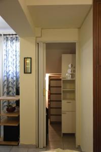 Kuchyň nebo kuchyňský kout v ubytování Poly's cozy home