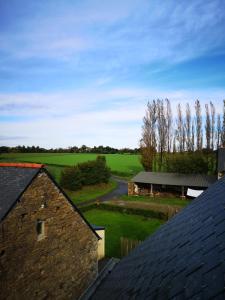 an aerial view of a farm with houses and a road at LE DOMAINE DE COAT ROGAN L'espace familial in Ploëzal