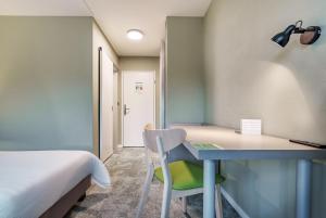 Postel nebo postele na pokoji v ubytování flexymotel Wil