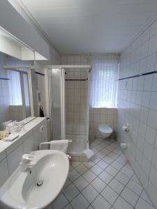 Koupelna v ubytování Hotel Zum Märchenwald