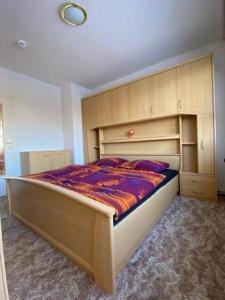 En eller flere senge i et værelse på Gästewohnung KL. WZL 40_4