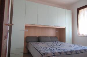 Postel nebo postele na pokoji v ubytování Casa Alice