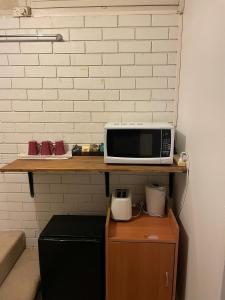 Kuchyň nebo kuchyňský kout v ubytování Mayfield Motel